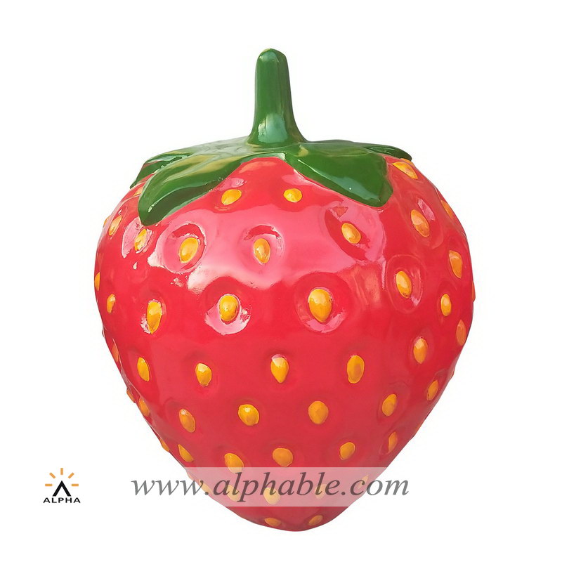 Giant resin strawberry sculpture