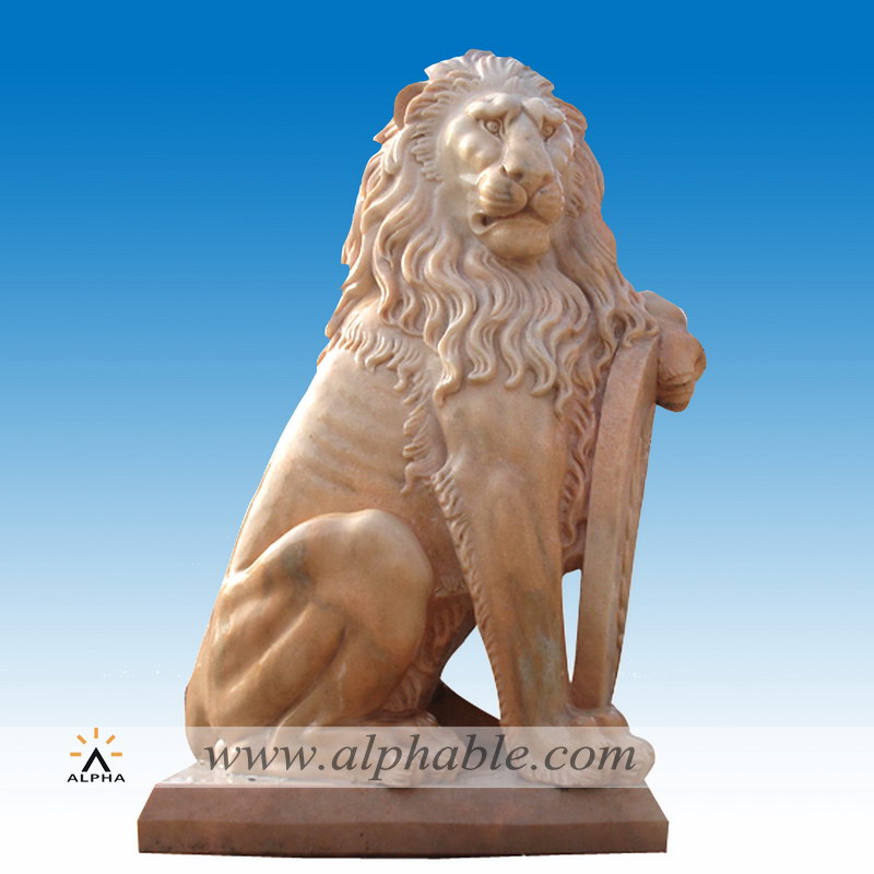 Carved pink marblelion sculpture with shield