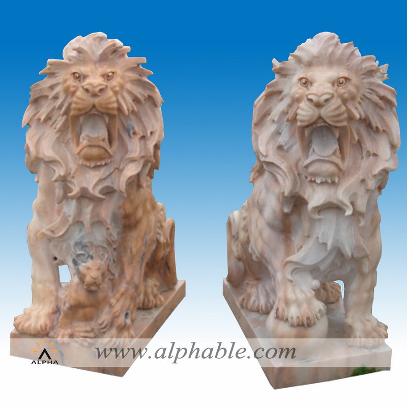 Carved stone couple lions statues