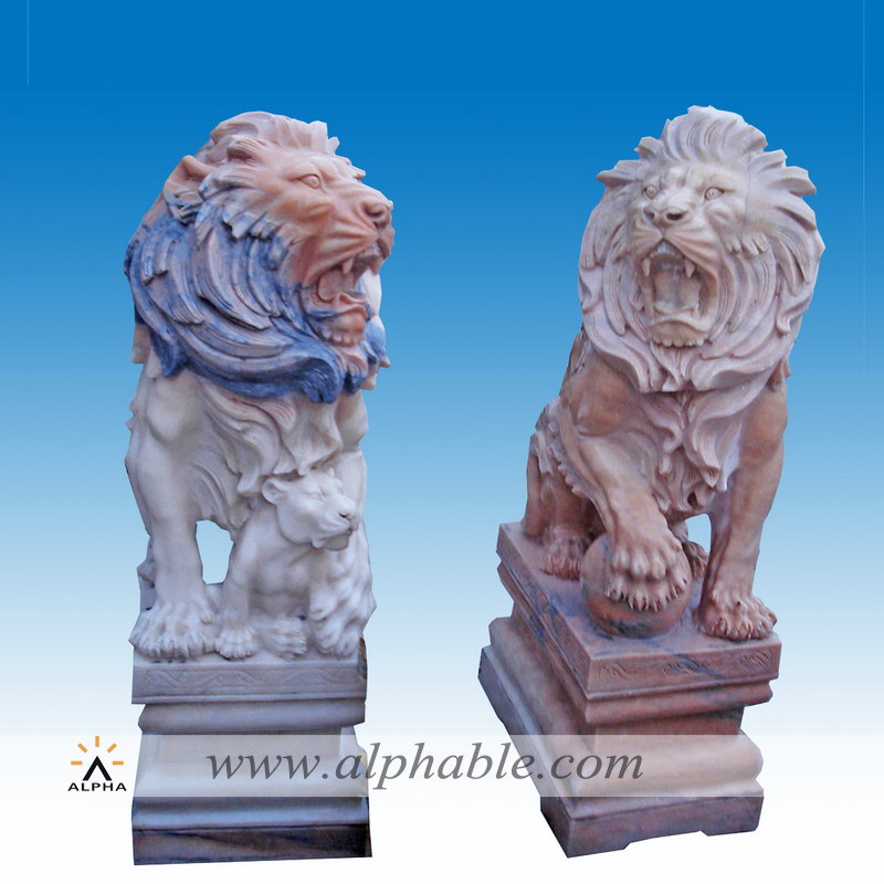 Carved marble couple lions statues