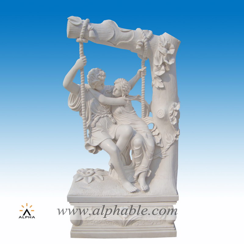 Marble children on swing sculpture