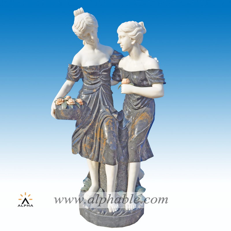 Marble statue of two maidens with flowers