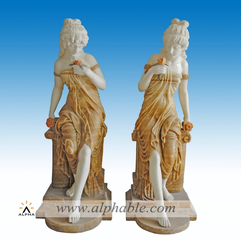 Marble entrance statues